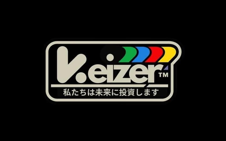 The Keizer badge: the Keizer wordmark with green, blue, red, and yellow stripes, and 私たちは未来に投資します underneath